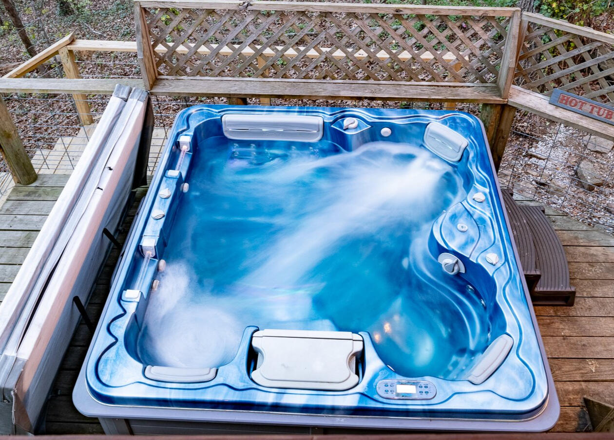 Soak with a View Relax in your private hot tub surrounded by trees and quiet nature—ideal for cool nights and morning coffee alike.